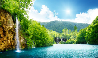 Waterfall lake trees mountains blue 3 - the middle of a lake free wallpaper