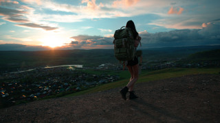 Woman backpack hill sunset town 2 - alena aenami free wallpaper