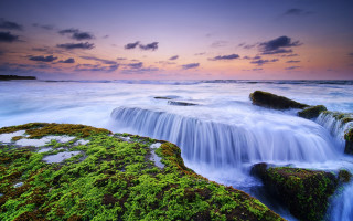 Waterfall mossy rocks purple sky - a purple sky above free wallpaper