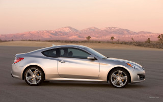 Silver sports car mountains sunset 2 - a parking lot free wallpaper