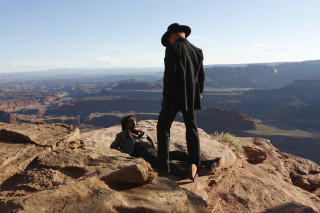 Man mountain suit hat rock - a man in a suit and hat free wallpaper