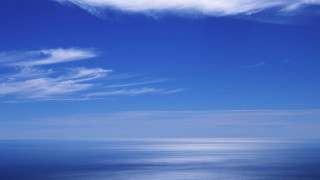Lone boat ocean blue sky 2 - ocean free wallpaper
