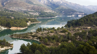 River mountains trees boats day - a few boat free wallpaper
