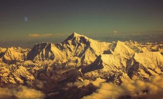 Mountain range moon clouds sky - a moon in the sky above free wallpaper