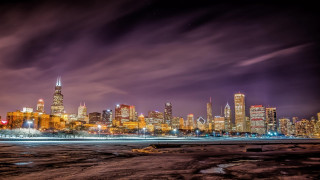 City skyline night purple clouds - a purple sky free wallpaper