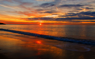 Sunset ocean wave beach sky - the beach in the distance free wallpaper