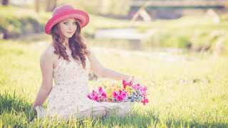 Woman pink hat basket flowers - a basket of flowers free wallpaper