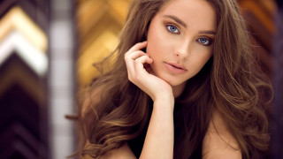 Woman long hair portrait blurry - her cheek free wallpaper