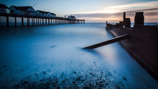 Long pier houses ocean sky - a few house free wallpaper