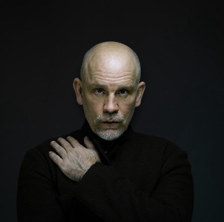 Bald man black shirt hands - david budd free wallpaper