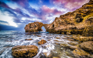 Rocky beach arch water mountain - a rocky beach free wallpaper