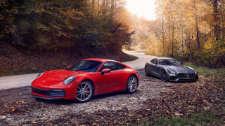 Two red sports cars forest - the wood next free wallpaper