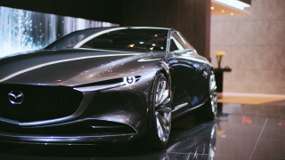 Futuristic car showroom fountain man - front view free wallpaper