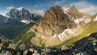 Mountain range snow capped bridge - a mountain range free wallpaper