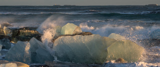 Ice chunks waves shore beach - ice free wallpaper