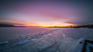 Snowy beach sunset ocean city - snow and ice free wallpaper