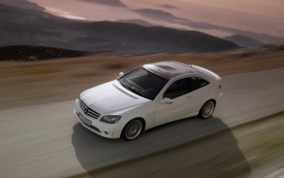 White car mountains sunset motion - digital free wallpaper