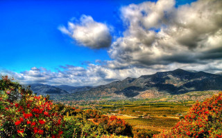 Scenic valley mountains clouds autumn 2 - a scenic view of a valley free wallpaper