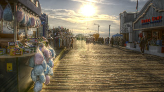 Boardwalk stuffed animals sunset cityscape - sunset free wallpaper