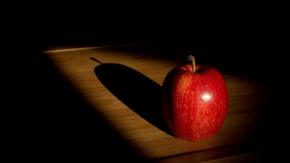 Red apple wooden table shadow - a red apple free wallpaper