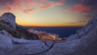 Fire pit mountain sunset ocean - a view of the ocean and mountains free wallpaper