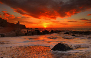 Sunset ocean waves rocks shore - wave free wallpaper