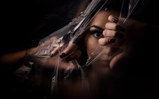 Woman dark makeup plastic bag - plastic free wallpaper