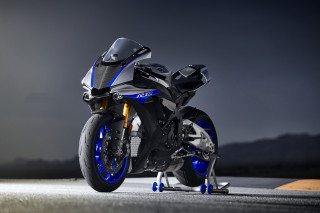 Blue black motorcycle street cloudy - a dark sky in the background free wallpaper