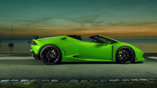 Green sports car waterfront sunset - a boat in the background free wallpaper