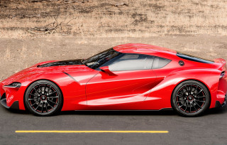 Red sports car side road - the side of the road in a parking lot free wallpaper