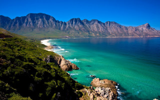 Beach mountains water boat landscape - a view of a beach free wallpaper