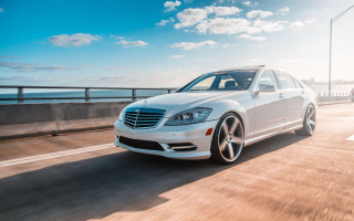 White car ocean bridge sky - a road next free wallpaper