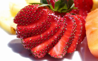 Strawberry banana closeup food photorealism - a white surface free wallpaper