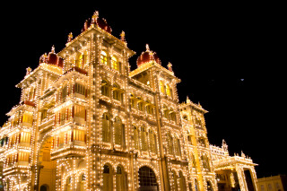 Large building lights clock tower - a large building free wallpaper