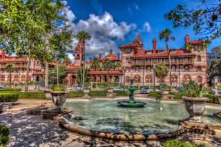Large building fountain trees cloudy - a cloudy sky above free wallpaper