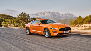 Bright orange mustang mountains trees - orange free wallpaper