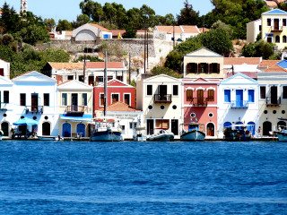 Houses lake boats hill shore - impressionist free wallpaper