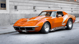 Orange sports car street building - ed roth free wallpaper