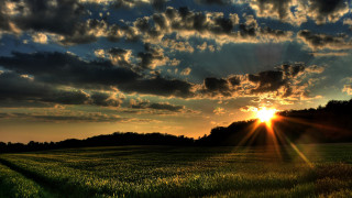 Sunset field urban mountain sky - crepuscular ray free wallpaper