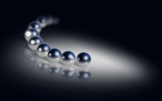 Balls black surface white light - constant permeke free wallpaper