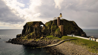 Lighthouse island bridge tiltshift award - a small island in the middle of the ocean free wallpaper