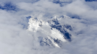 Mountain view plane window clouds - a view of a mountain free wallpaper