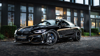 Black car night building light - a black car free wallpaper