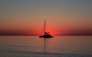 Boat sailing sunset water dawn - sunset free wallpaper
