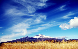 Field mountain clouds blue sky - the sky above free wallpaper