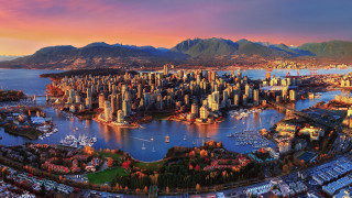 City mountains water boats skyline - the background and a body of water free wallpaper