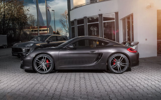 Grey sports car building black - a black car in the foreground free wallpaper