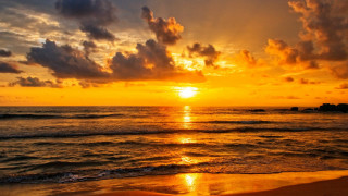 Sunset ocean clouds waves beach 2 - the sand free wallpaper