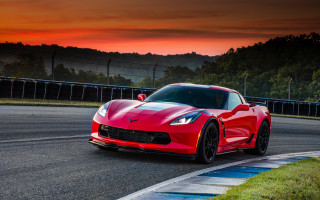 Red sports car race track 50 - a red sky in the background free wallpaper