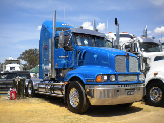 Blue truck field mountains vehicle - anson maddock free wallpaper